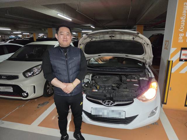 아파트 지하주차장에서 진행한 준중형 세단 더 황금무역 작업 사진