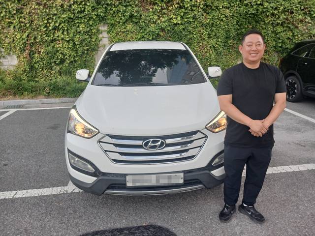 야외 주차장에서 진행한 SUV 더 황금무역 작업 사진